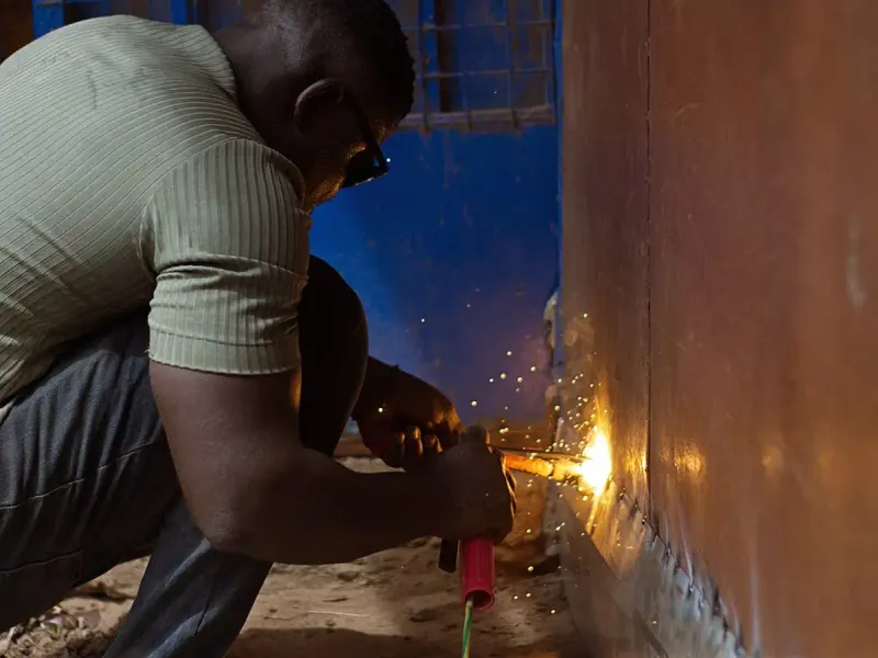 Welder at work in a workshop